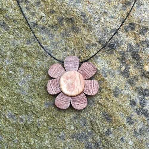 Seven petal flower pendant by Treetop Trove