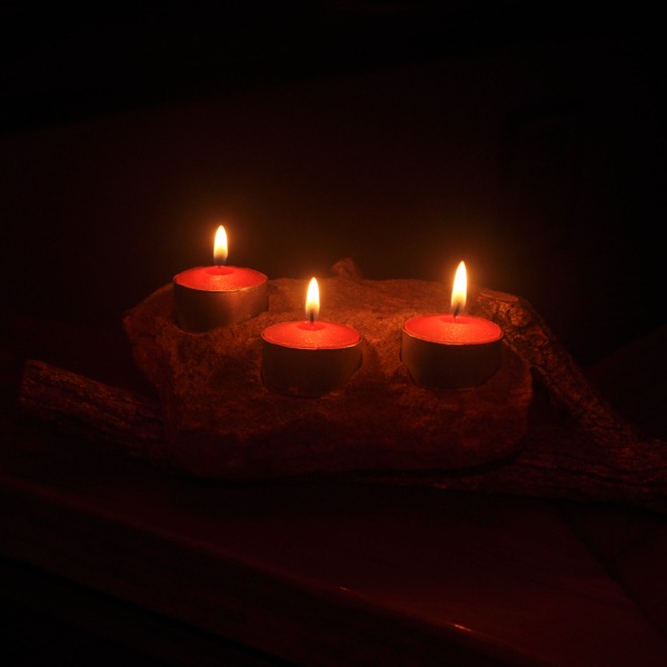 Sandstone and Eucalyptus Candle holder - Candles burning